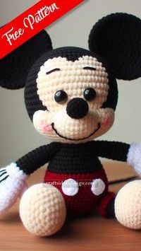 The Mickey Mouse amigurumi captures the magic of Disney's most iconic character in the cozy, tangible form of crochet. This little figure, with its distinctive ears and bright red shorts, is a beloved project for Disney fans and crafters alike. Bringing this cheerful character to life in yarn form not only sparks joy but also pays homage to the endearing legacy of the mouse who started it all.