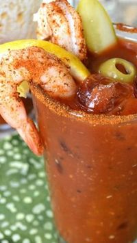 When you are going to indulge in a Bloody Mary drink, Go Big or Go Home!! This is THE Ultimate Bloody Mary Recipe, exploding with flavor and practically a meal in itself. No bloody mary mix required.