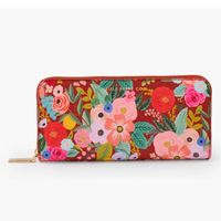 With A Classic Shape And Our Signature Florals, Our Garden Party Continental Wallet Has Room For All Your Essentials. The Violet Interior Has Eight Card Slots, Two Slip Pockets And A Zipper Compartment For Spare Change. Brass Zippers And Pulls Add The Perfect Finishing Touch. Details 7.75" L 3.75" W 1.25" H Textured Pu With Metal Hardware Printed In Full Color With Foil Stamped Logo Gold Zipper And Hardware 8 Card Slots 2 Bill Compartments 1 Zipper Coin Compartment Zip Around Closure