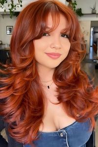 Copper red is a vibrant shade with warm undertones that can range from orange to reddish-brown. This beautiful shade catches and reflects light which helps enhance the texture of layered hair and also creates a dynamic appearance. @golddust_intuition