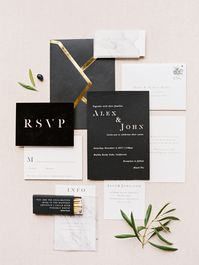 There's no rule that says your metallic details have to be on the invitation itself. The Idea Emporium dressed up these envelopes with a thick gold edge and kept the invitation itself entirely black-and-white.