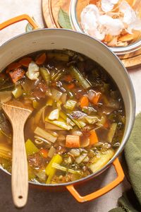 a pot of vegetables to make stock cooking in a pot.