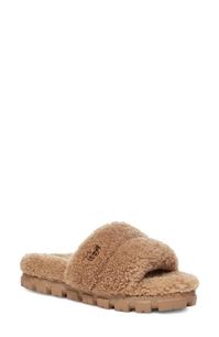 Slip into the plush comfort of a lightweight slide sandal lined in genuine shearling with a grippy traction sole perfect for jaunts out of the house. 1" platform (size 11) Genuine-shearling upper/UGGplush wool-blend lining/synthetic sole Shearling may be sourced from Australia, Ireland, Spain, the UK or the USA. See packaging for confirmed country of origin Imported