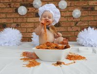 Why have a cake smash when you can have a spaghetti smash! Baby Chef outfit customised with your baby's name on the hat :-)