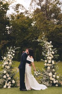 wedding arch greenery and white flowers