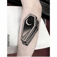 Coffin staircase tattoo on the forearm