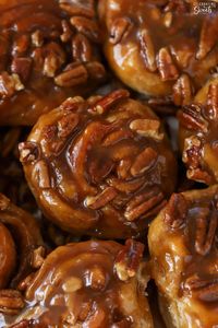 Closeup of pecan topped sticky buns.