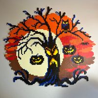 Dimensions: 17 inches by 19 inches This lovely Perler bead creation is perfect for Halloween decorations! There are small imperfections.