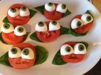 Tomatoes with basil leaves