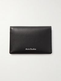 Find ACNE STUDIOS Printed Leather Wallet on Editorialist. Acne Studios' wallet perfectly captures the label's Scandinavian minimalist vibe. Made from supple leather, it's detailed simply with the logo in silver-tone lettering at the front and opens to reveal two card slots and one billfold compartment for cash.