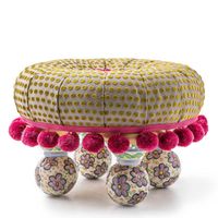 Created top to bottom by our artisans in Aurora, New York, this accent stool is upholstered in woven dot fabric and embellished with exaggerated pink pom-pom trim. This playful footstool sits on four ceramic ball feet, hand-painted with our classic Myrtle pattern. | MacKenzie-Childs Magnifique Tuffet Silk / Polyester in Green / Pink / Yellow | 14.5 H x 21 W x 21 D in | Wayfair Ottomans