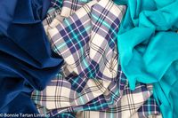 Thistle Marine tartan with matching Bonnie Marine velvet on the left and Bonnie Aqua velvet on the right.