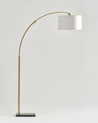 Our modern elegant take on the arc floor lamp. With a beautiful brass finish and gorgeous black marble base, the Logan LED floor lamp will add elegance and class to any space.