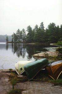 3 canoes. Rental bathtub-boat, my parents' lovely old green Mad River, and my uncle's handbuilt cedar strip beauty.