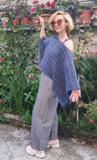 The cotton yarn crocheted.Indigo hole poncho jumper.Loose sweater. A wonderful piece with the harmony of color and model.  **Suitable for size:EU(34/36/38)   US(0-2/2-4/6)  ** The products in this shop can be given as gifts on special days. If you contact for this, a special packaging can be made.    Wash Instructions: Machine washable at low temperatures. *machine wash gentle (40 C/104 F) *tumble dry on low heat        *Pay attention to the washing instructions in order to use your products for