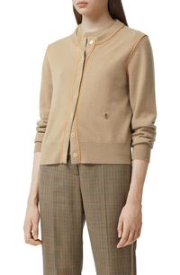 Free shipping and returns on Janice TB Monogram Piped Cashmere Cardigan at Nordstrom.com. Contrast piping outlines a cashmere cardigan branded with a monogrammed logo medallion honoring the label's founder, Thomas Burberry.