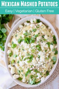 Cheesy mashed potatoes are combined with peppers, chilies & spices for a delicious & easy side dish of Mexican Potatoes, perfect for your next fiesta!