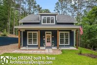 A shed dormer sits above the 4-columned front porch into this attractive cottage house plan. Inside, the left side of the home is open front to back.    On the right, the bedrooms are split by the two bathrooms and laundry room giving you as much privacy as can be afforded in this small footprint. The dormer is for aesthetic purposes only.  Related Plans : Get alternate versions with house plans  51903HZ  (1,299 sq. ft.),  51847HZ  (1,070 square feet),  51