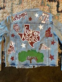 Custom painted college spirit denim jacket. Each jacket is handpainted by me. These are perfect a perfect gift or purchase for any event or memorabilia. This jacket is completely customizable to you.  If you have any special requests or questions please message me and I will be happy to accommodate! Rush order options available, message for details!