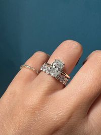 It's a known fact that oval diamond rings look amazing stacked. We stacked this oval solitaire with a scalloped oval eternity ring.