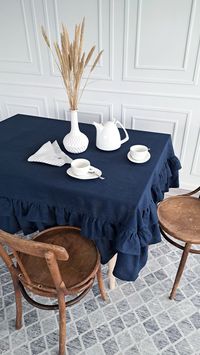 "Rectangle or squared double ruffled tablecloth covers your table with the long dark touch of stonewashed linen, creating a cozy boho or shabby chic style. The splendidly falling folds of soft linen give an ornate and exclusive look to your table. It is a 100% natural linen product, therefore these tablecloths can become a great accent to different types of interiors. Use them during the holidays or for various occasions: weddings or christenings, birthdays, or baby showers. These handmade table