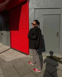 🐆 help, i have not stopped wearing these trainers 👟♥️ . . . . #dailyoutfit #ootdgals #adidassneakers #adidassl72 #leopardprinteverything #vestairecollective #trendsxmb #howtowear #streetstyle_daily | leopard print trousers, adidas originals sl72, pop of red outfit, street style london, ootd, daily outfit, fashion inspo