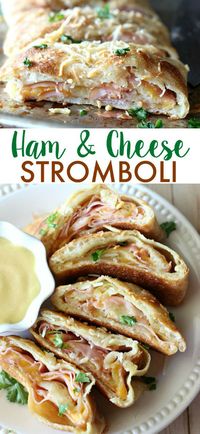 This Ham and Cheese Stromboli is SO GOOD! Pizza crust is stuffed with honey mustard, monterrey jack cheese, and smoky Black Forest Ham, then baked to a crispy and cheesy perfection!