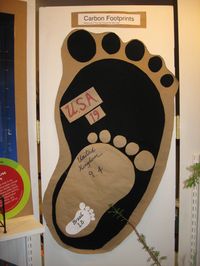 Get kids involved. Simple brown bags and packing paper have many applications outside of the market or post office. In this case, kids used the paper product to display facts about Americans' carbon footprints.