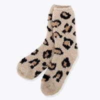 Keep your toes cozy and warm all winter with Women’s Fuzzy Leopard Socks from Marleylilly. Featuring a fuzzy tan leopard pattern, these soft socks add a layer of coziness to your look.Paired with leggings and a coordinating monogrammed pullover, these Leopard Socks add the perfect finishing touch to any cold-weather outing or when cozying up on the couch.​Made of a soft polyester and spandex blend.This item is not monogrammed.One size fits most adults.