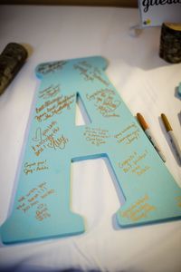 Instead of a guest book, have guests sign a large monogram of your new last name initial