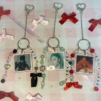 Ariana Grande That Boy Is Mine Inspired double sided photo keychain! Choice of That Boy is Mine, Positions or Eternal Sunshine, album keychain! This keychain features a heart lobster clasp and square photo frame inspired by Ariana Grande .      ♡ Notes ♡ These keychains are handmade so be very delicate~ Best to avoid water to keep them in their best form       ♡ Follow us on social media!♡ Tiktok and Instagram: @Stickypawpals ੈ ⛦ Thank You Beary Muchੈ ⛦