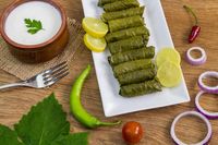 Mahshi or Mahsy - Egyptian Tradional cuisine. Grape leaves stuffed rolls with le #Sponsored , #Affiliate, #Affiliate, #Egyptian, #Mahshi, #cuisine, #Tradional