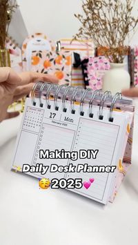 Making a DIY Daily Desk Planner for 2025 🥳✨You can prop it up, it has dated dailies for the entire year if 2025 👏 Materials used: - Paper any kind - Chipboard - White Glossy Sticker Paper - O-wires - Cinch machine The planner has been created in the A6 size. The design has been made and downloaded from planify pro. If you’re a seller interested in using them commercially ✅ check out the business plan, it comes with all patterns, templates and fonts ✨