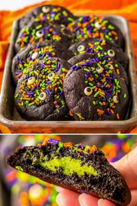 These dark chocolate Halloween cookies pack a fun surprise - a creamy slime-filled center! Rich black velvet cookies are stuffed with a bright green cheesecake filling and topped with candy eyeballs and festive sprinkles for a spooky cookie recipe that is perfect for Halloween.