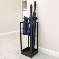 Geometric design matte black metal freestanding umbrella holder for rain or sun with bottom drying drip tray Ideal for keeping in your entryway, mudroom, or foyer for when you exit and enter your home 2 slots provide space for umbrellas, walking sticks, and canes, while the freestanding design allows the rack to be stored anywhere you need it Industrial black metal d brings a contemporary addition to any home or office décor 17 Stories | 17 Stories Freestanding Umbrella Stand in 20.07 H x 8.66 W