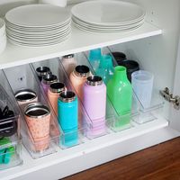 Do you find it frustrating when you open the cupboard and drink bottles fall everywhere? I decided to try some crystal file storage containers from the office...and they worked a treat! Containers available at OrganisedHQ.