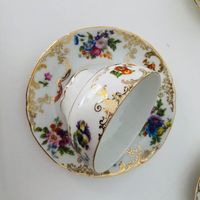 Vintage floral set of 4 cups and saucers set in excellent condition, makers mark reads “ Victoria China Czechoslovakia “ Saucers 5.75"D  Cups 2. 5"H