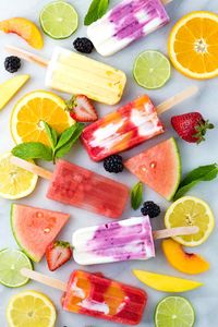 Healthy homemade fruit popsicles made with five ingredients or less! Four delicious recipes to choose from, strawberry, watermelon, lemon, and coconut.