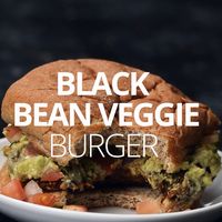 This Black Bean Burger Recipe is PACKED with vegetables and flavor and is super quick and easy to make. All you need is 10 minutes and a food processor! Vegan. Gluten Free. showmetheyummy.com #veganrecipes #glutenfree #veggieburger #burgerrecipes