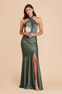 Stephanie is our sleek matte satin halter bridesmaid dress in Eucalyptus. Shop Birdy Grey for timeless style and affordable luxury. Paging Charlotte York! This classic halter gown is both sophisticated and romantic. | Eucalyptus Bridesmaid Dress Matte Satin Size 1X | Birdy Grey Stephanie