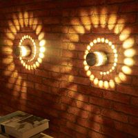 Description: A decorative light illuminating a circle that brings a cozy and playful ambience to any room, porch or outdoor area.    Main Features: Bright Warm-White LEDs wall light Decorative fixture, can be used as wall light or ceiling light  Easy to install, comes with screw set Low power consumption and environm