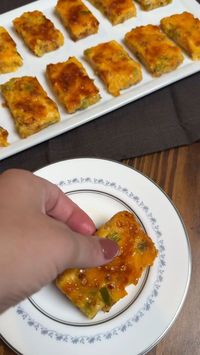 Spice up your game day with these Texas Jalapeño Cheese Squares, the perfect last-minute game day snack that's as easy as it is irresistible! Combining bold Texan flavors with the kick of jalapeño and the melt-in-your-mouth richness of cheese, these squares pack a punch and come together in no time—making them the go-to easy game day appetizers. Don’t miss our video recipe to see just how simple whipping up this crowd-pleaser can be.