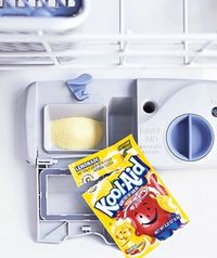 Lemonade Kool-Aid as Dishwasher Cleaner    Clean lime deposits and iron stains inside the dishwasher by pouring a packet of lemonade Kool-Aid (the only flavor that works) into the detergent cup and running the (empty) dishwasher. The citric acid in the mix wipes out stains; you don't have to