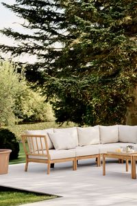 Step into a world of timeless elegance with Fritz Hansen's Tradition outdoor collection. Crafted by designer Povl B. Eskildsen, this series of garden furniture is an ode to tradition and beauty. With modular outdoor seating and teak tables, it's perfect for relaxing under the golden sunset or creating unforgettable moments under the twinkling evening sky.