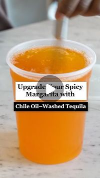 Punch on Instagram: "Want to add a spicy kick to your next Margarita? Try fat-washing with chile oil, a technique inspired by @muhsman’s tropical Lucy Liu cocktail. Tap the link in bio for the recipe and more ways to add complex heat to your next round.

#drinkstagram #bartending #hacks #tequila"