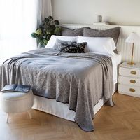 Vienna Shams and Coverlet in Moonlight, Bria Pillowcases and Sheets in White, Lynette Accent Pillows in Sterling and Moonlight.