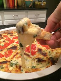 the BEST dip you will EVER eat.  cheesy caprese dip.  yum!