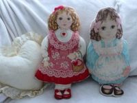 twin doll shaped pillows from fabric panels