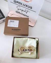 RDluxus | Burberry TB gold-plated brass earrings with pearls🤩 #burberry #designerjewelry | Instagram