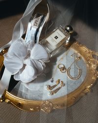 Jo Malone London Badgley Mischka Amélie George Bridal | Modern Wedding Accessories photo by weddings by md, wedding band by James and Sons | white satin bridal shoes, bow heels, pearl drop bridal earrings, vintage gold ring, wedding perfume, wedding fragrance, nectarine blossom and honey, aquamarine necklace, something old something new something borrowed something blue, editorial wedding details